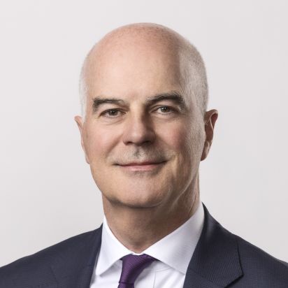 Headshot of middle-aged man in a suit