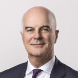 Headshot of middle-aged man in a suit