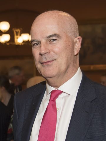 Two men in suits facing camera