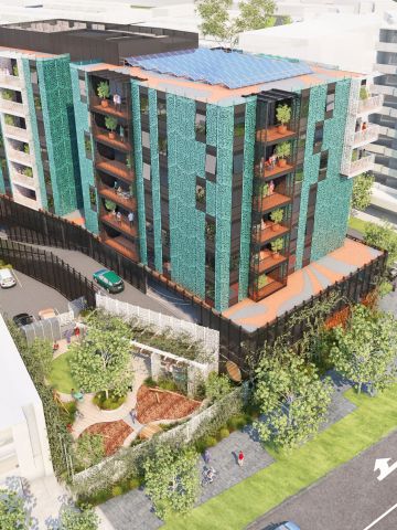 Aerial view of new multi-story building of apartments with ajoining courtyard