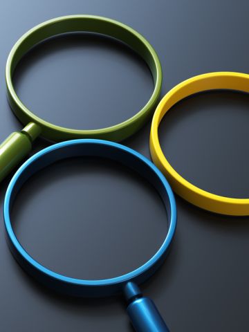 3 magnifying glasses, one blue, one green, one yellow
